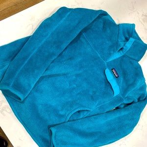Patagonia. Perfect brand new condition. Turquoise color. Never worn.